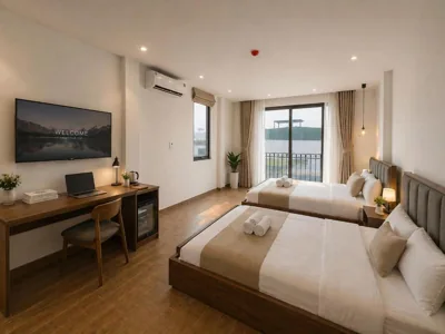 Suite familiare con balcone — Alan Lumière Boutique Hotel Hanoi