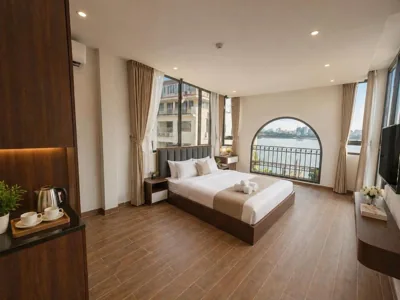 Suite con vista sul lago — Alan Lumière Boutique Hotel Hanoi